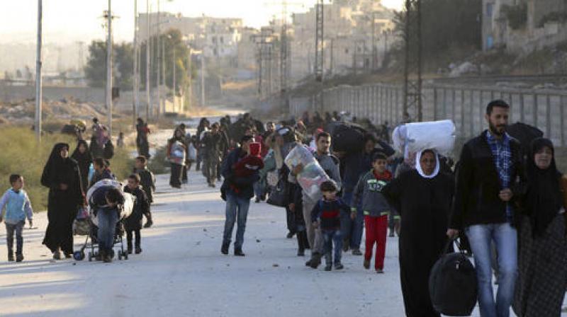 The Britain-based monitor said more than 20,000 people had fled to western neighbourhoods of the city held by the government, with another 30,000 moving to areas held by Kurdish forces. (Photo: AP)