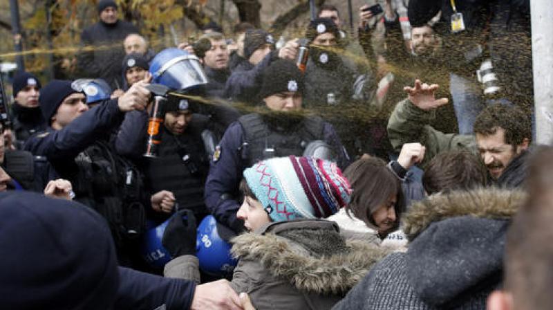 Riot police stopped around 150 protesters from different organisations including left-wing groups and womens rights activists from demonstrating outside the education ministry in Ankara over allegations that negligence led to the blaze. (Photo: AP)