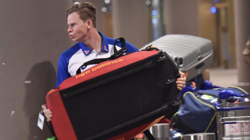 Steve Smith was seen hauling a kit-bag upon arrival at the Mumbai airport. (Photo: PTI)