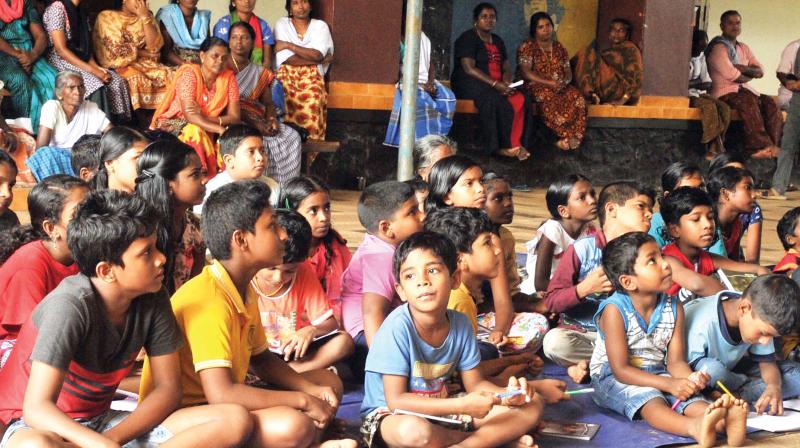 Children being entertained at a relief camp in Alappuzha on Monday.