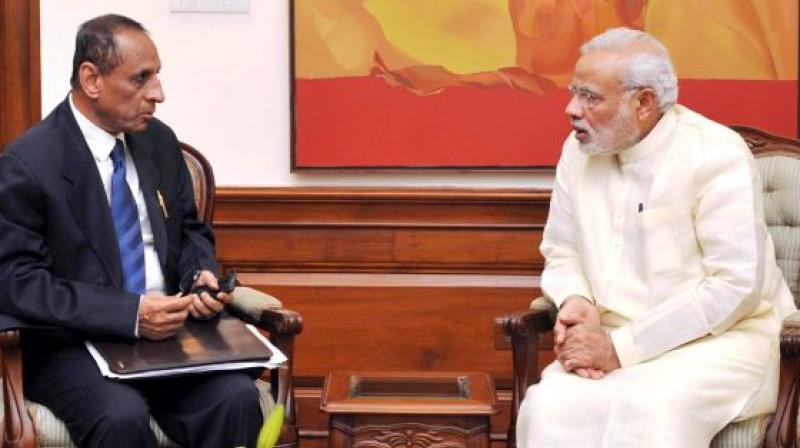 Prime Minister Narendra Modi with Governor of Andhra Pradesh and Telangana E.S.L. Narasimhan in New Delhi (Photo: PTI)