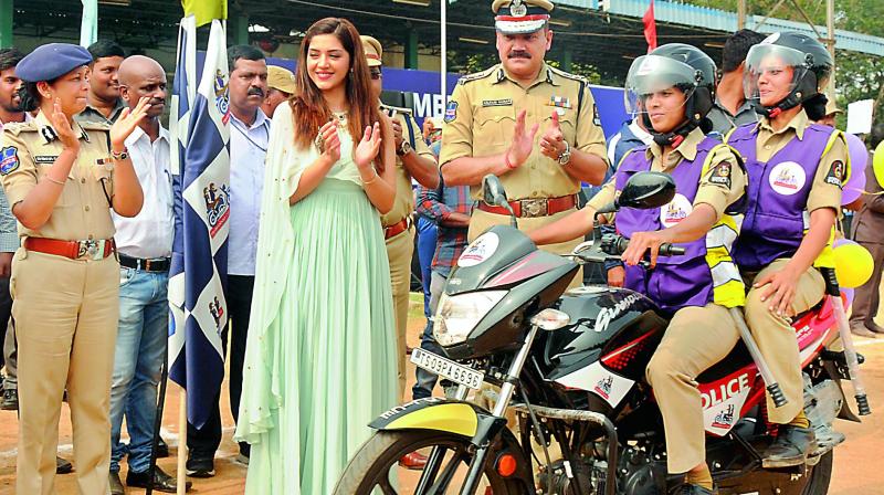 Police Commissioner Anjani Kumar, Additional Commissioner Shikha Goel and actress Mehreen Pirzada launch Women on Wheels at the Goshamahal police stadium. The newly recruited women also displayed combat techniques.