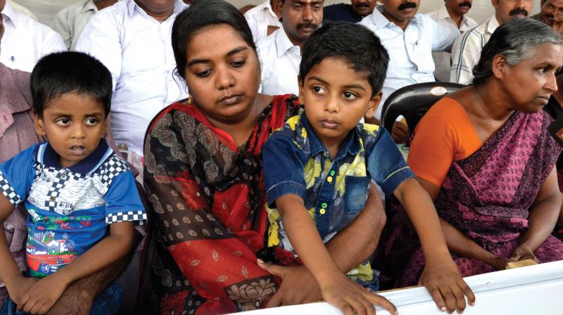 Viji on dharna in front of the Secretariat along with her sons Albin and Allen, on Monday