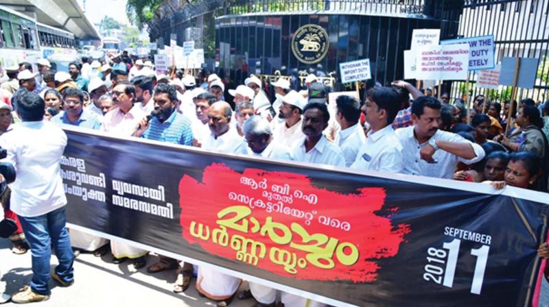 The protest march by the Kerala cashew industry joint protest council commences from RBI junction in Thiruvananthapuram on Tuesday.