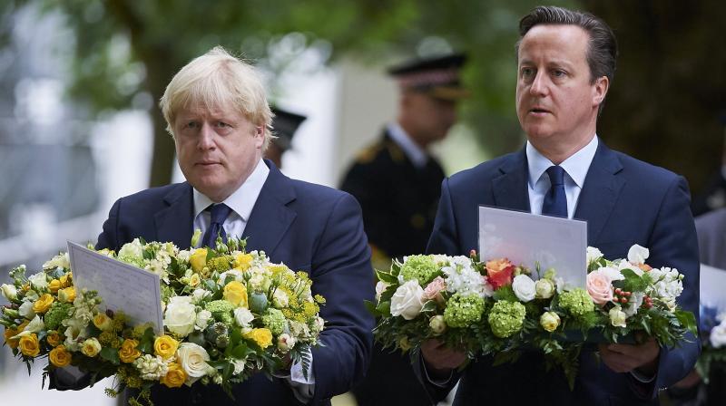 Former British PM David Cameron and UK Foreign Secretary Boris Johnson. (Photo: AFP)