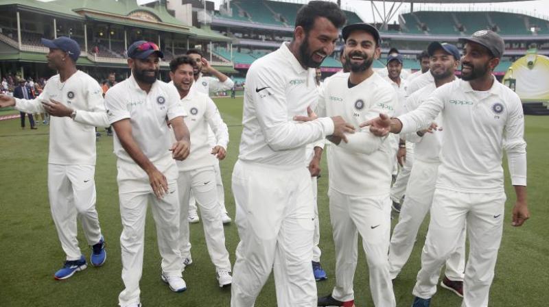 While player of the series Cheteshwar Pujara was seen dancing with his teammates, Kohli uploaded a celebratory post in Twitter. (Photo: AP)