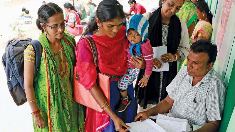 Teacher graduates submitting the application for temporary teacher posts at Presidency Girls Higher Secondary School in Chennai on Sunday.(DC)