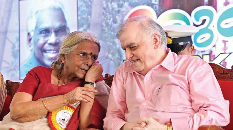 Governor P Sathasivam with poet Sugathakumari at the University College Alumni Association meet in Thiruvananthapuram on Friday. (Photo: DC)