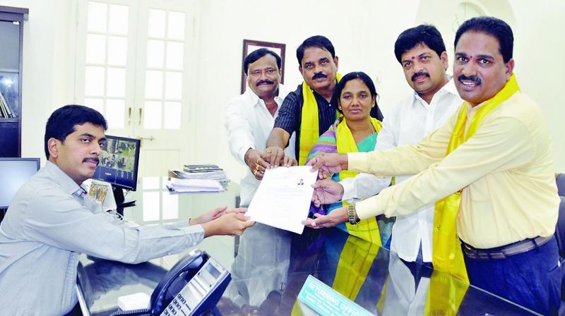 TD MLC candidate for Graduates constituency, K.J. Reddy, accompanied by minsiters and MLAs, file nomination papers at the collectorate in Anantapur on Monday. 	 DC