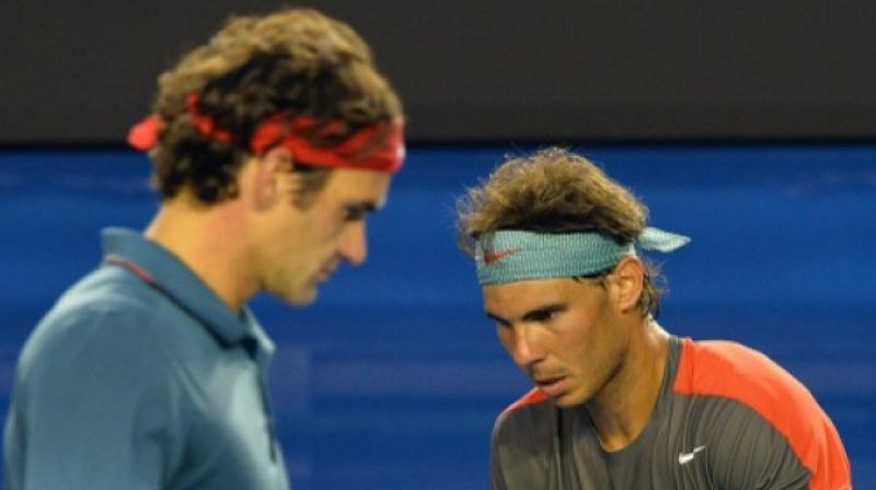 Rafael Nadal has a 6-2 record over Roger Federer in Grand Slam finals. (Photo: AFP)