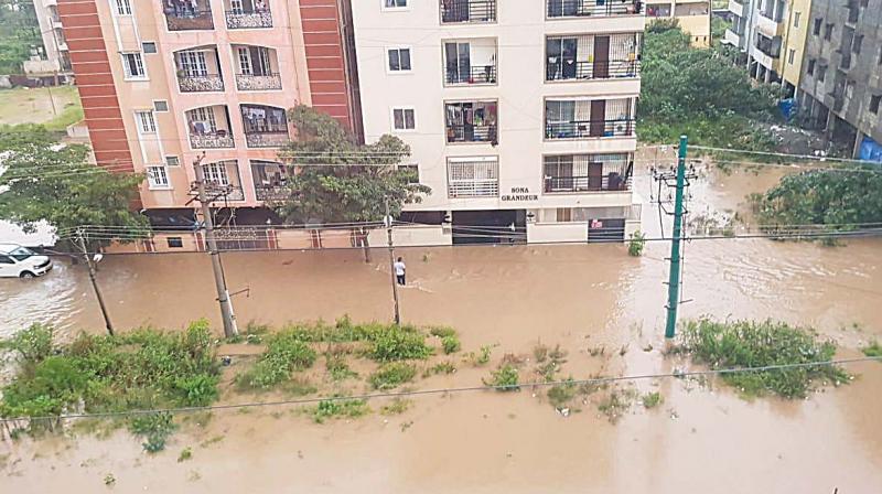 Flooded apartment blocks at  mla Layout on Bannerghatta Road on Monday  (Photo: DC)