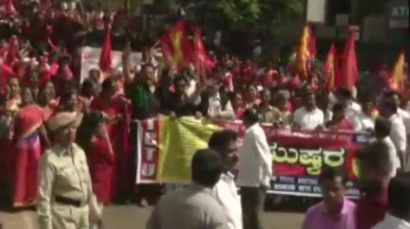 The 10 central trade unions (CTUs) which have given a call for the two-day Bharat Bandh are protesting the governments snub of their 12-point charter of demands seeking minimum wage of Rs 18,000, social security for all workers and issue related to price rise. (Photo: ANI | Twitter)