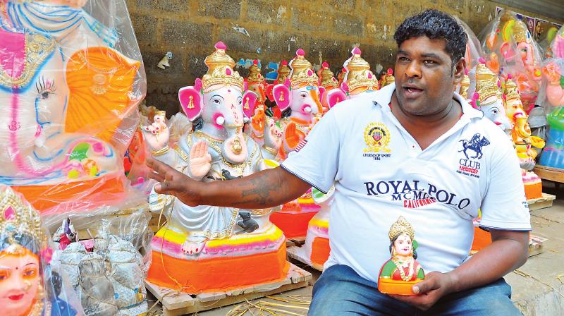 Lawrence, the artisan on Pottery Road who makes clay  Ganesha idols