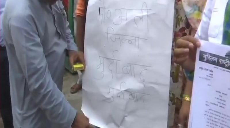 The controversy surrounding Jinnahs poster triggered after the BJP Aligarh MP Satish Gautam wrote a letter to AMUs vice-chancellor seeking an explanation on the portrait of Pakistans founder in the students union office. (Photo: ANI)