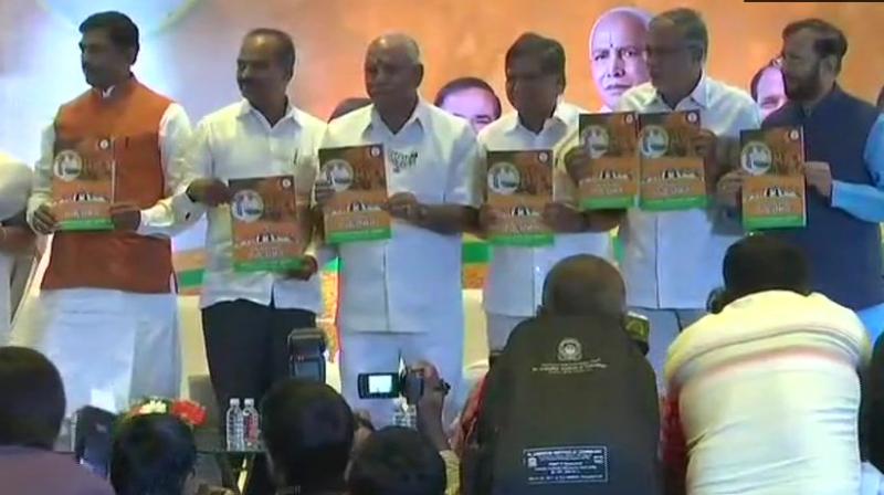 BJPs chief ministerial candidate BS Yeddyurappa released the partys manifesto along with other senior party leaders. (Photo: Twitter/ANI)