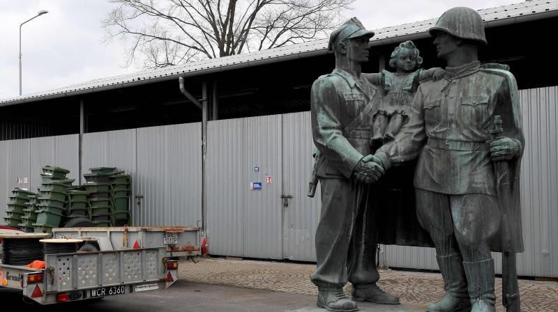 A monument dedicated to Soviet Red Army soldiers stands on the grounds of a warehouse in the Polish town of Legnica, where the monument is being mothballed, on March 24, 2018.  (Photo: AFP)