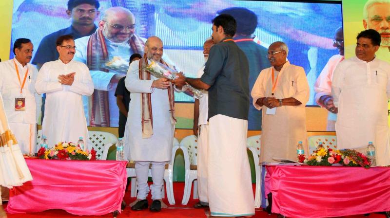 BJP President Amit Shah at a conference of elected representatives in Kaloor, Cochin, Kerala. (Photo: Twitter | Amit Shah)