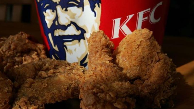 KFC told her that ads meant to let people see the chicken (Photo: AFP)