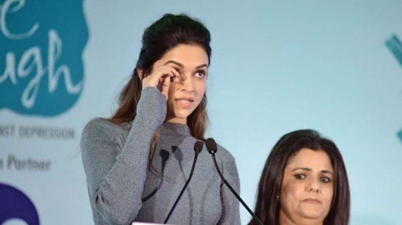 Deepika tears up at a Live Love Laugh event.