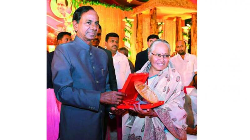 K. Chandrashekar Rao felicitating Beula Gabriel