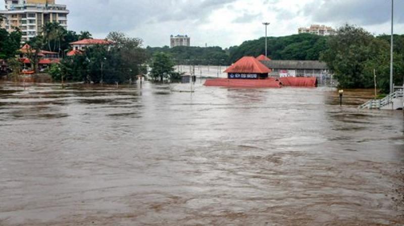 Aluva Mahadeva Temple is seen submerged in the water following a flash flood, triggered by heavy rains, at Kochi in Kerala. (Photo: PTI)