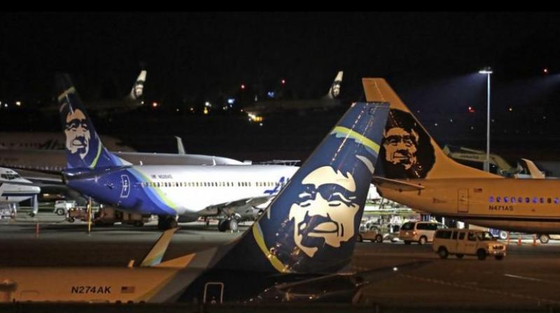 Alaska Airlines planes sit on the tarmac at Sea-Tac International Airport on Friday evening. (Photo: AP)