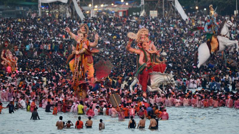 Devotees carried idols of Lord Ganesh for immersion in rivers and lakes across Maharashtra on Sunday morning, marking the culmination of the 11-day festival. (Photo: Rajesh Jadhav)