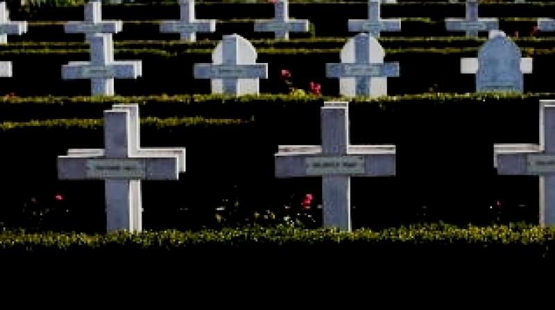 We need a roof above our heads to sit down and have a coffee when we visit our dead (Photo: AFP)