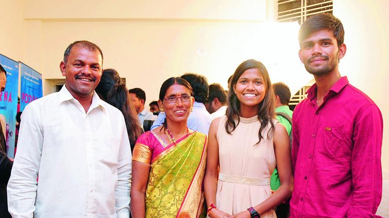 Happy family: Poorna Malavath along with her parents Devi Das, Laxmi and brother Naresh.