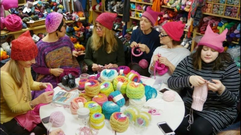 A group gathers at Knitty City in New York on January 17, 2017 to make pink Pussyhats in preparation for protests for womens rights following the election of Donald Trump. (Photo: AFP)