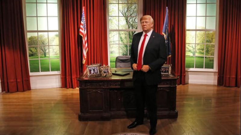 Madame Tussauds unveil the wax figure of US President-elect Donald Trump, days ahead of the Americans Presidential Inauguration in Washington, in London. (Photo: AP)