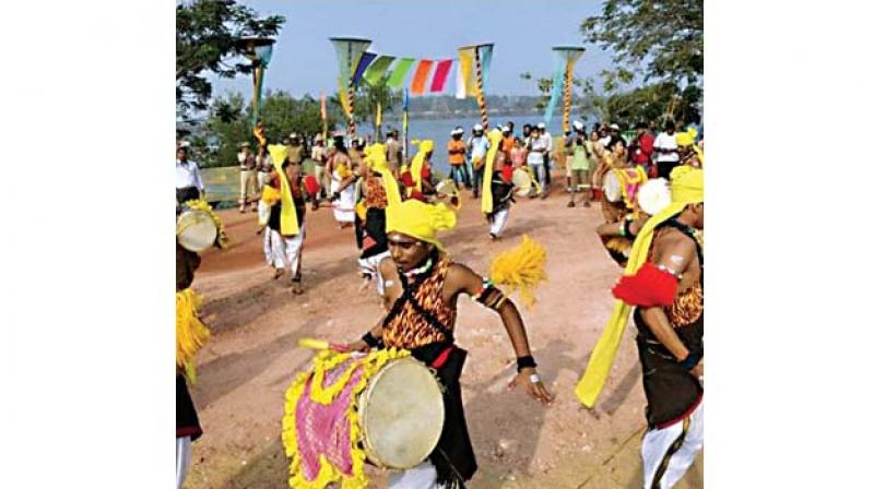 Folk artistes perform at the inauguration of the two-day river festival in Mangaluru on Saturday.