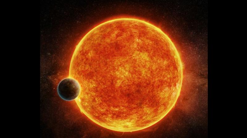 An artist impression released by the European Southern Observatory on April 19, 2017 shows a planet named LHS 1140 located in the liquid water habitable zone surrounding its host star (Photo: AFP)