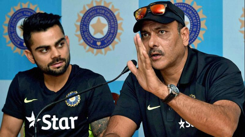 Virat Kohli, who had differences with former India coach Anil Kumble, has enjoyed solid relationship with Ravi Shastri, who worked as Team India director before Kumble was appointed as India coach. (Photo: PTI)