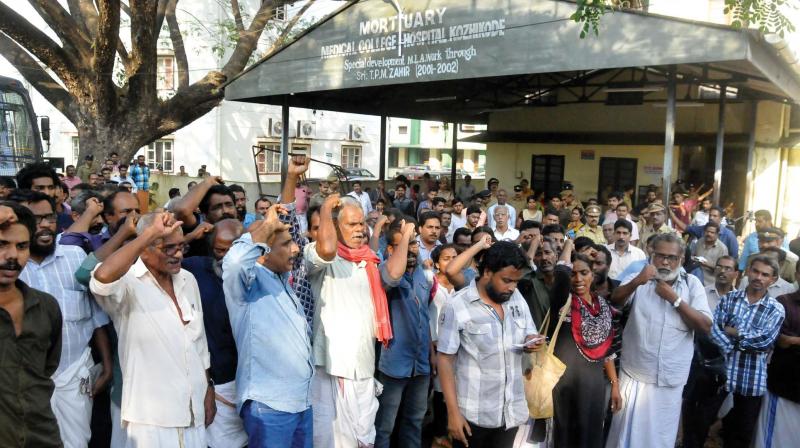 Human rights activists and Maoist sympathizers shouting slogans in front of the mortuary at MCH when the bodies of the duo were brought for postmortem. (File pic)