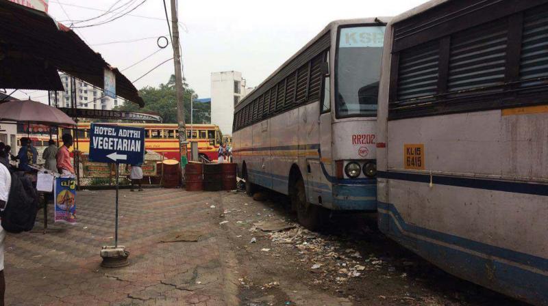 The filth surrounding the parked KSRTC buses close to Thampanoor bus stand entrance. 	By arrangement