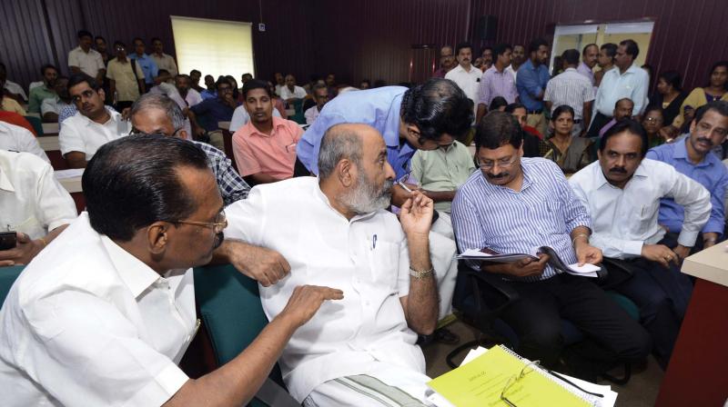 Excise Minister T.P Ramakrishnan and Water Resources Minister Mathew T. Thomas during a review meet held in Chakkittapara on Monday.