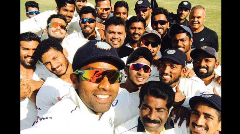 Keralas captain Sachin Baby takes a selfie with team members beating Haryana on Tuesday to reach the quarterfinals of Ranji for the first time ever.