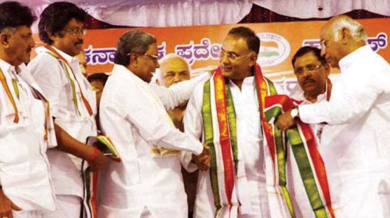 KPCC chief Dinesh Gundu Rao with senior Congress leaders in this file photo