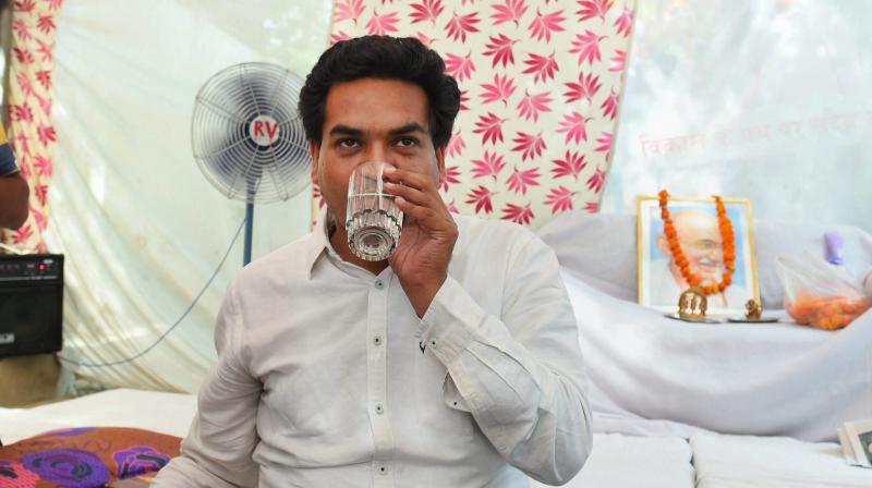 Sacked Delhi minister Kapil Mishra on the 2nd day of an indefinite hunger strike against the alleged misuse of public money to send Delhi Chief Minister Arvind Kejriwals close aides on a foreign trip, at his residence in New Delhi. (Photo: PTI)