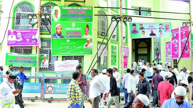 The Haj House is decked up with several bunting and banners of various political parties. 	(Image: DC)