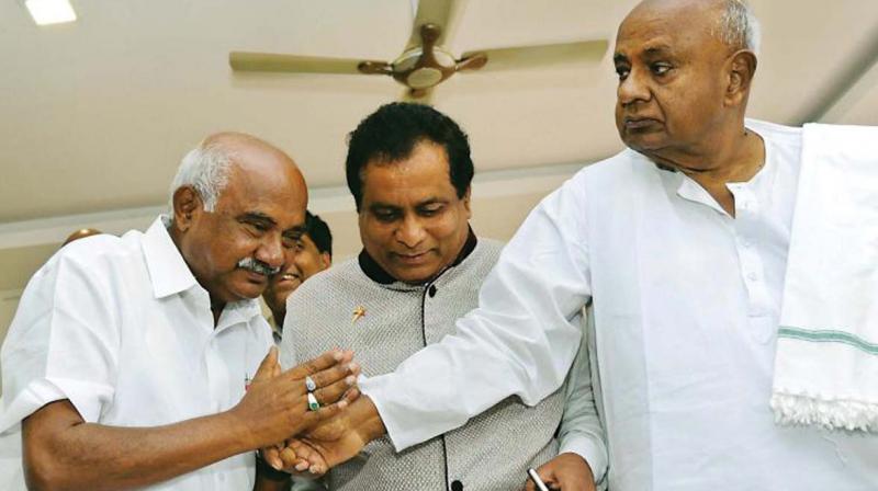 JD(S) supremo H.D. Deve Gowda with newly-appointed party state president  A.H. Vishwanath in this file photo   (Image: DC)