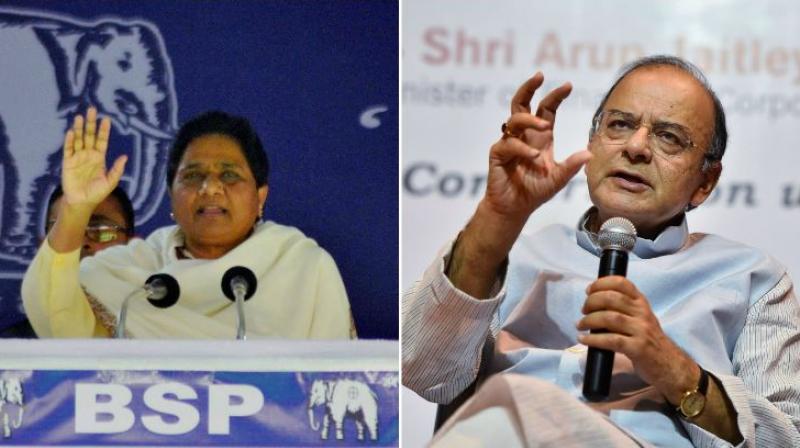 BSP supremo Mayawati and Finance Minister Arun Jaitley. (Photos: PTI)