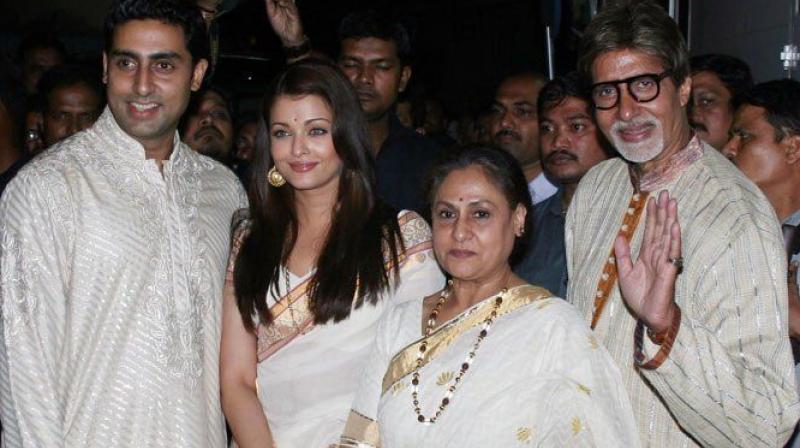 (Left) Abhishek Bachchan with (Right) Aishwarya Rai Bachchan.