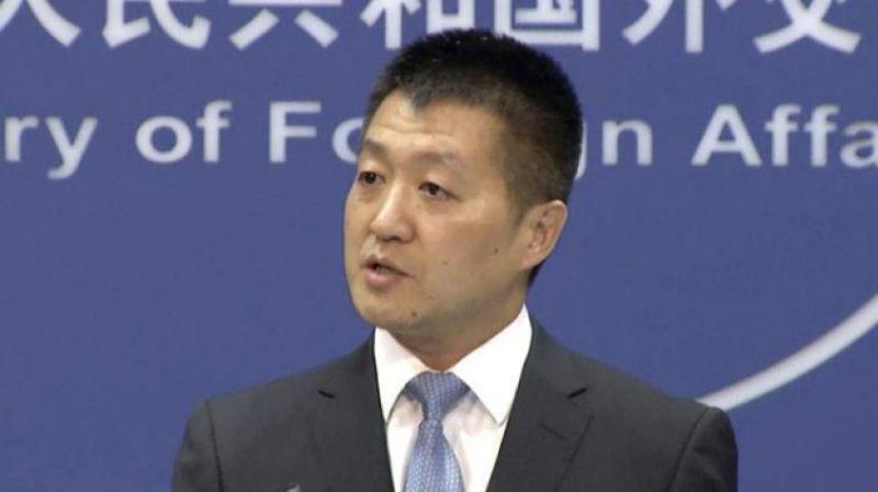 Lu Kang said the situation in the sea has been cooling down, thanks to efforts by China and the Association of Southeast Asian Nations. (Photo: AP/File)