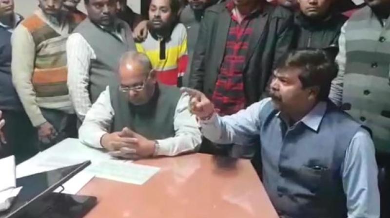 Sharma, a local BJP leader and formerly also an office bearer in the local party unit, barged into the office of Man Singh Chauhan, a senior police official in Meerut. (Screengrab)