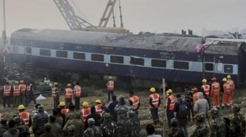 Rescue workers wrapped up the efforts to pull out the trapped passengers from the mangled bogies after an overnight operation under the floodlights including using cold cutters to open up the compartments. (Photo: AP)