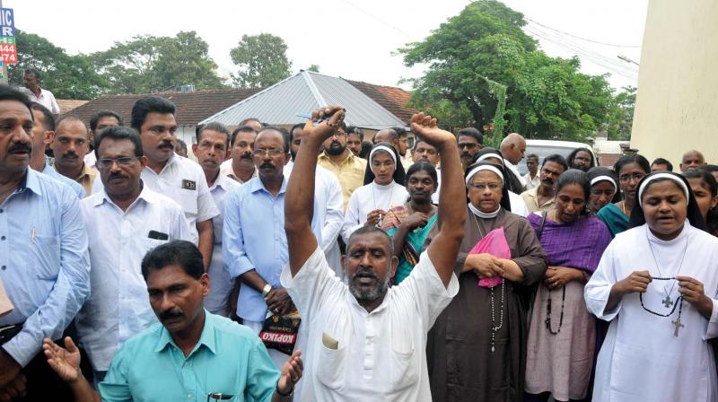 Believers wait in front of the Pala sub-jail for Bishop Franco Mulakkal to come out after getting bail from Kerala High Court in Kottayam on Tuesday.	 Rajeev Prasad