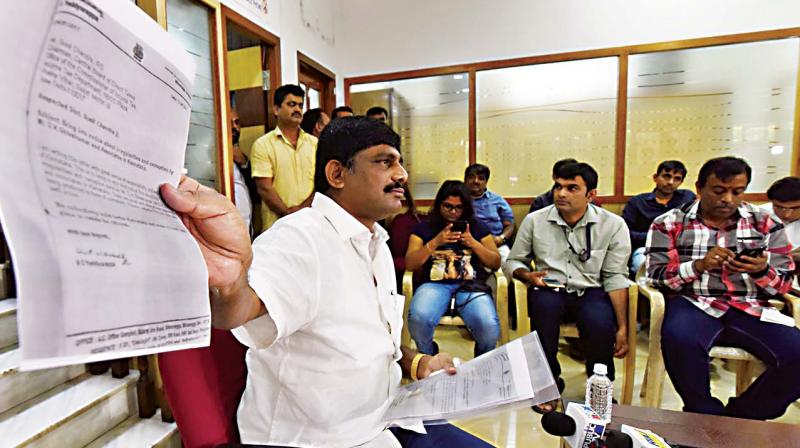 Congress MP and Water Resources Minister D.K. Shivakumars brother D.K. Suresh addresses the media in Bengaluru on Saturday (Photo: DC)