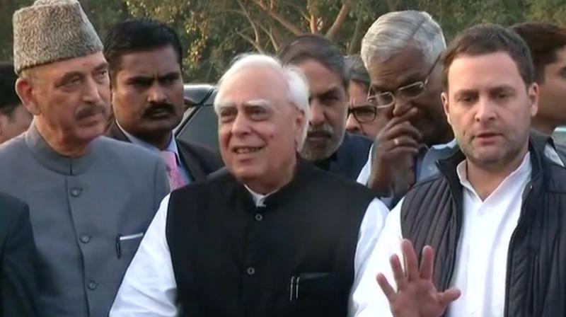 Congress President Rahul Gandhi and 114 lawmakers from 15 parties met President Ram Nath Kovind in Delhi on Friday over Judge Loya death case. (Photo: ANI/Twitter)